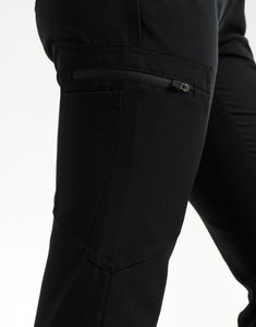 close up of thigh pocket of black flare scrub pants