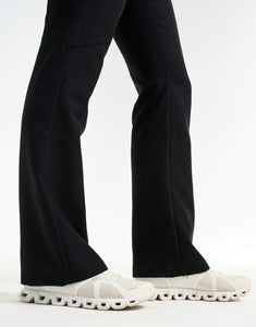 ankle of black flare scrub pants