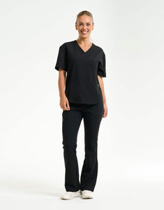 full body of black flare scrub pants