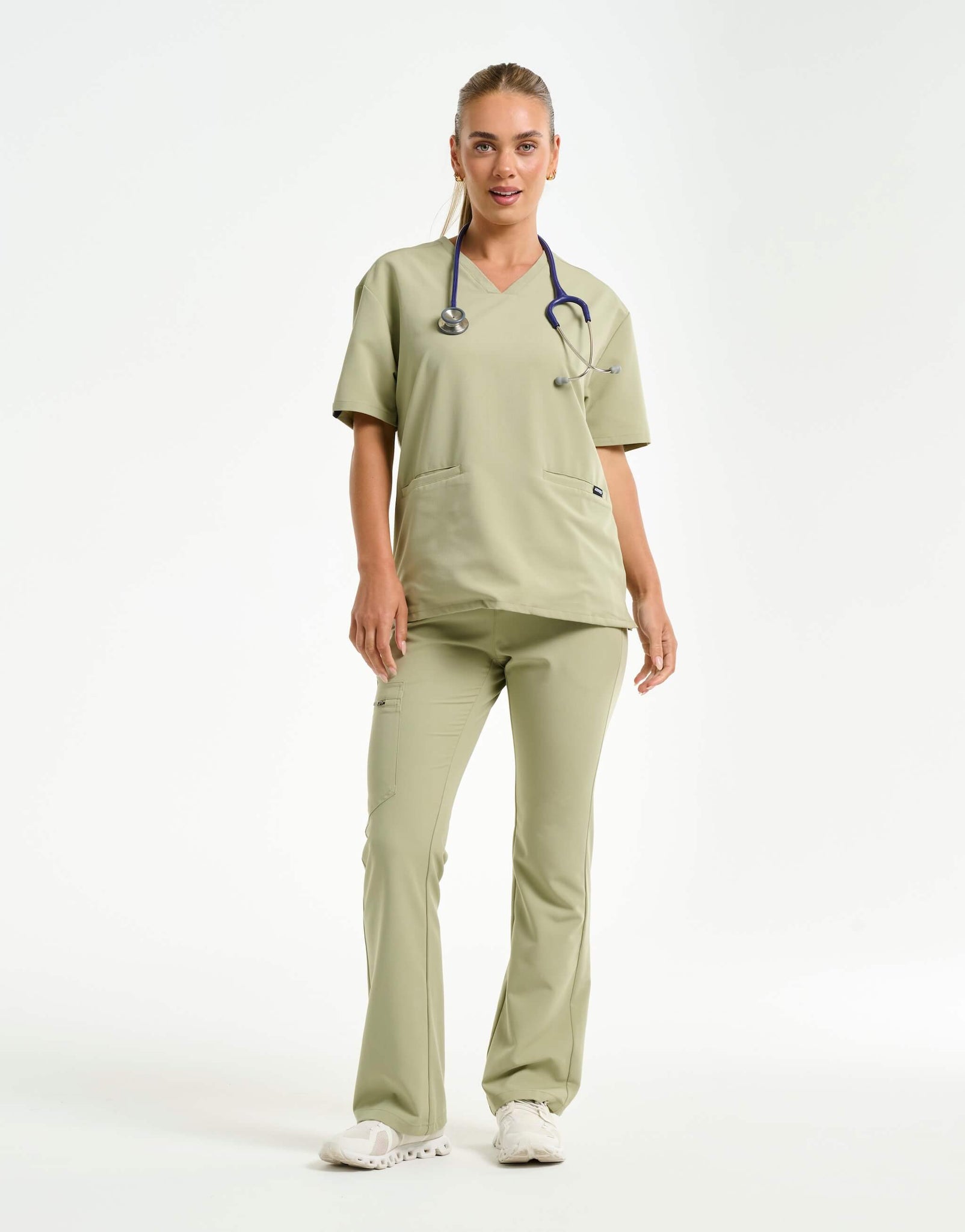 full body with stethascope of matcha flare scrub pants
