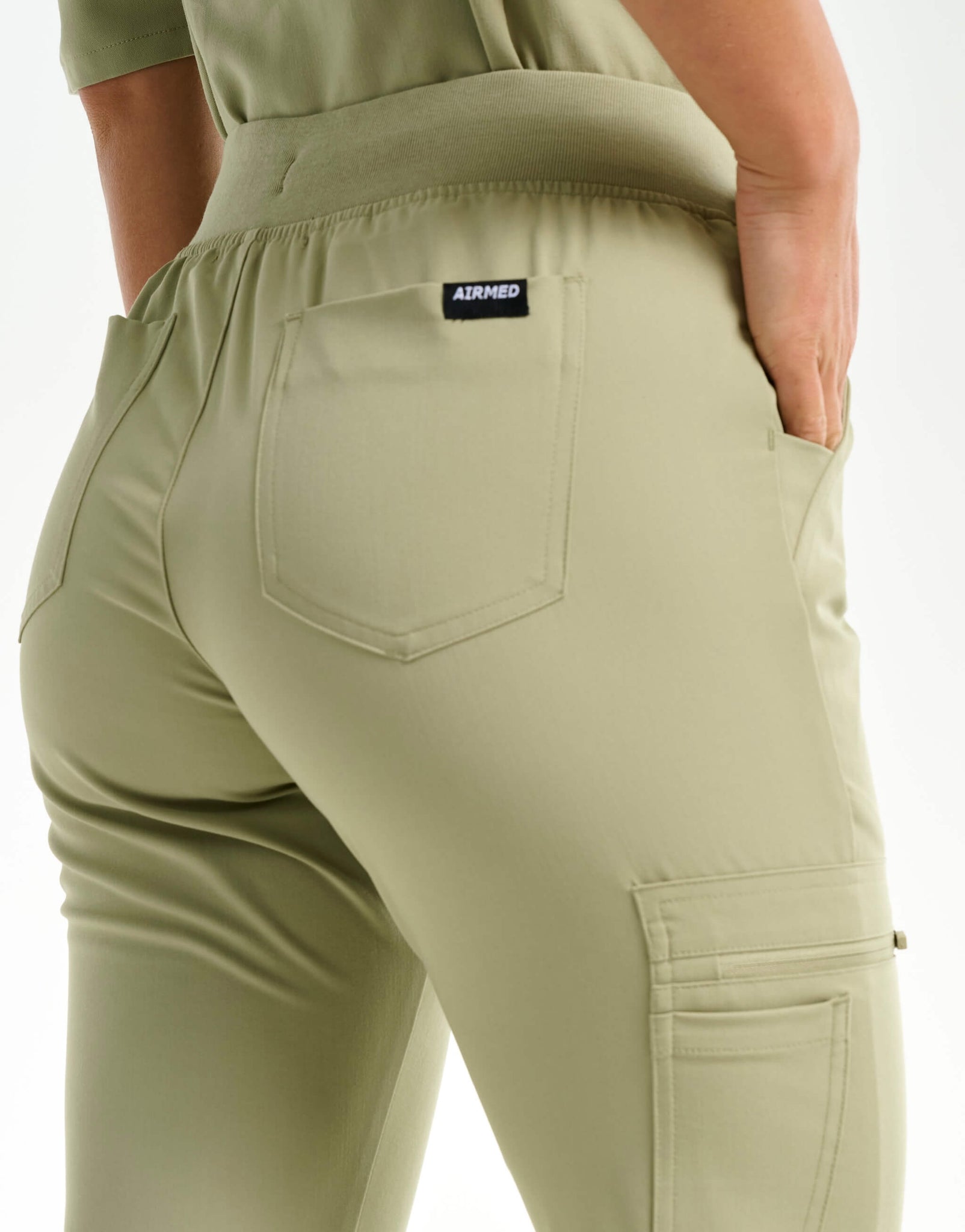 rear of matcha flare scrub pants