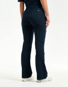 left with thigh pocket of midnight navy flare scrub pants