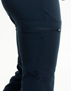 close up of thigh pocket of midnight navy flare scrub pants