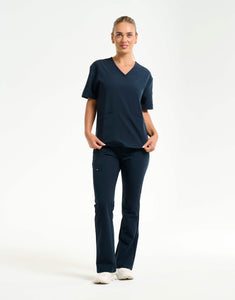 full body of midnight navy flare scrub pants