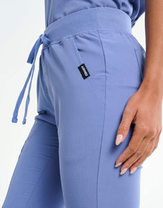 close up of hip pocket of nova blue flare scrub pants