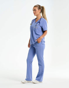 full body with stethascope of nova blue flare scrub pants