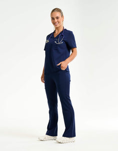 full body with stethascope of true navy flare scrub pants