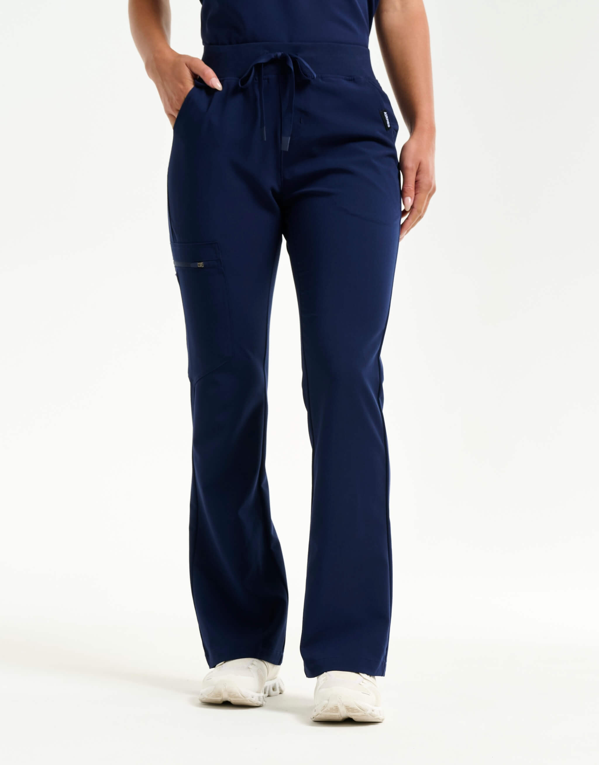 front of true navy flare scrub pants