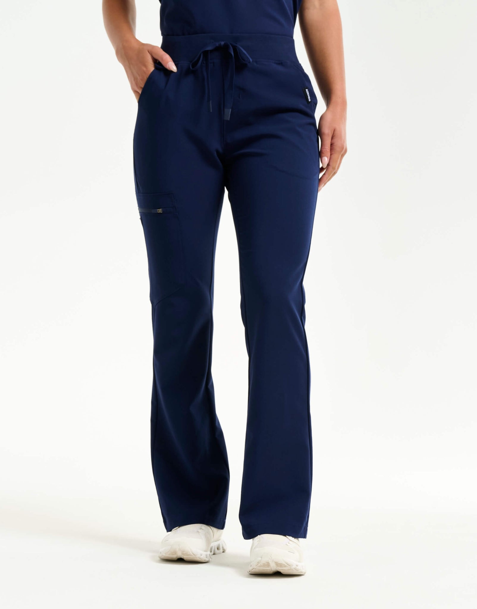 front of true navy flare scrub pants