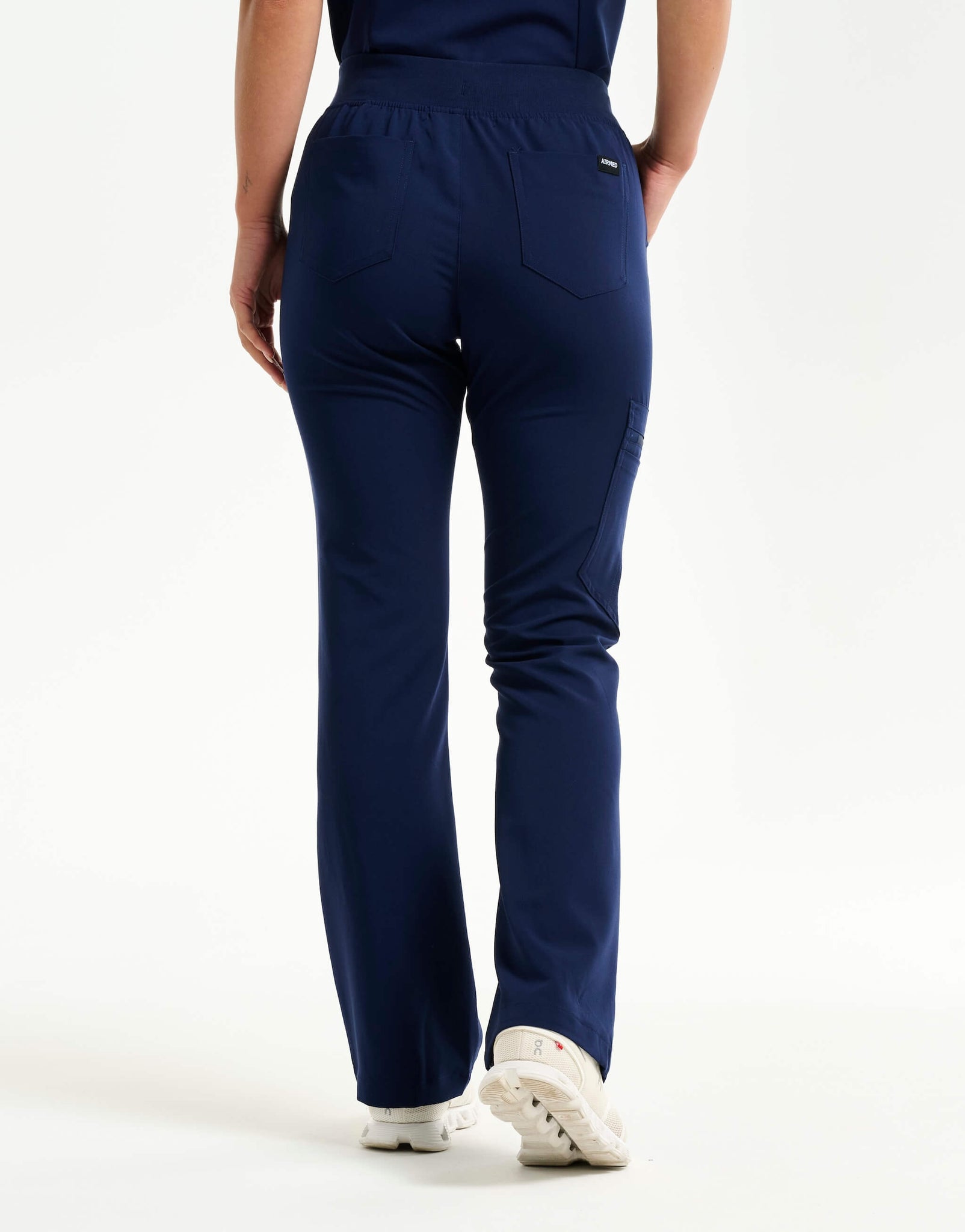 back of true navy flare scrub pants