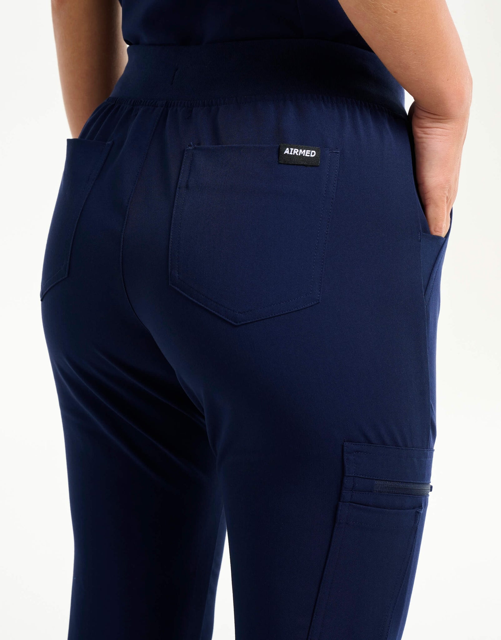 rear of true navy flare scrub pants