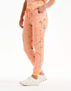 right view with hip pocket of peach jogger scrub pants