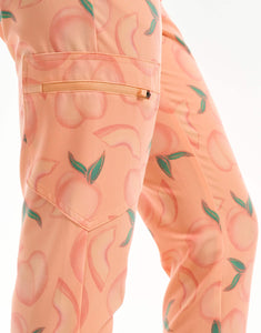 close up of thigh pocket of peach jogger scrub pants