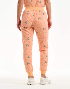 back view of peach jogger scrub pants