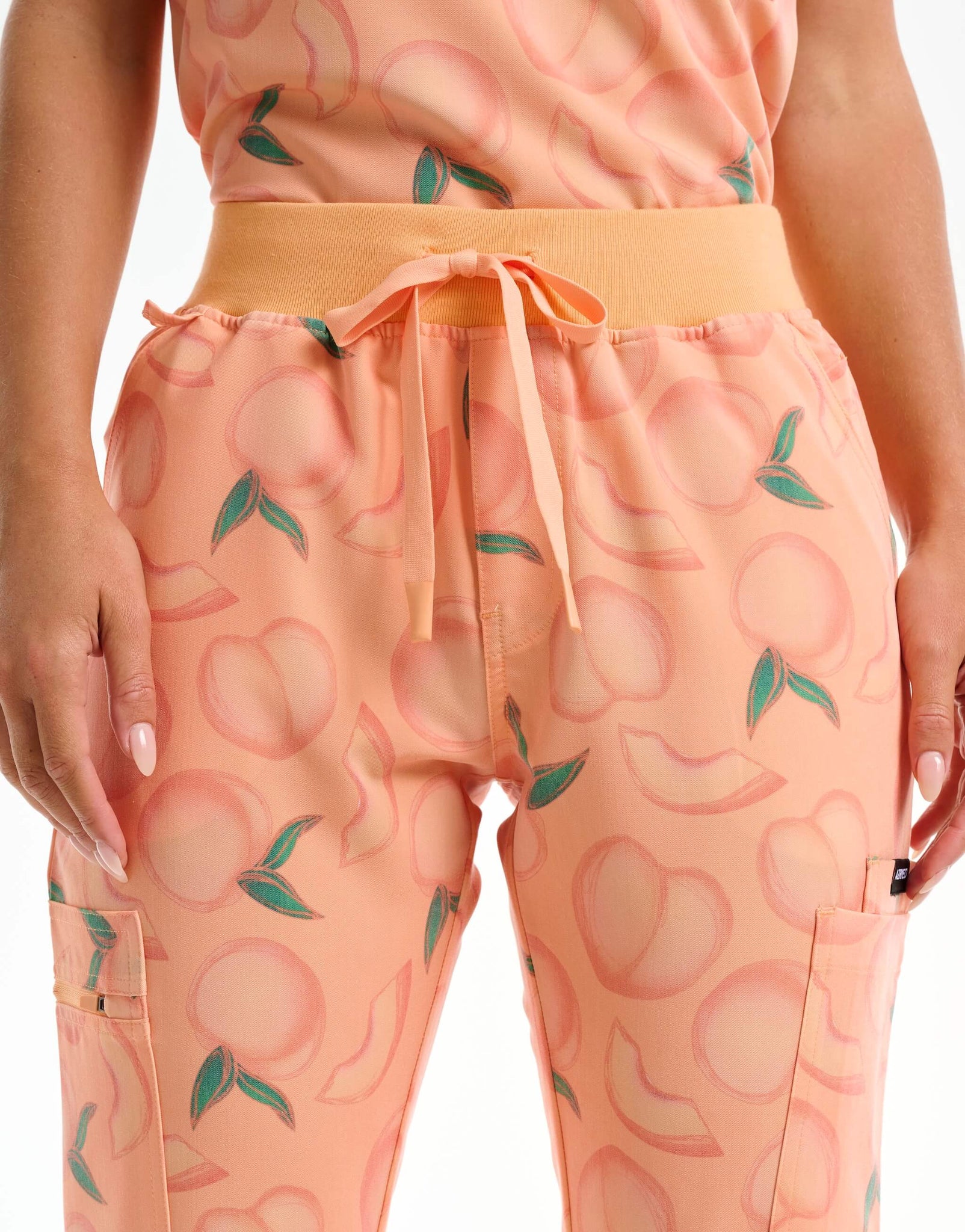 waist of peach multi-pocket scrub pants