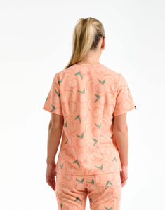 back view of peach one pocket v neck scrub top